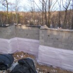 Advanced Insulation Spray-In Insulation around Concrete Block